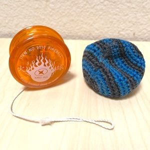 Yoyo and Hackysac toy set. Orange Yoyo, blue & black Hacky-Sac.